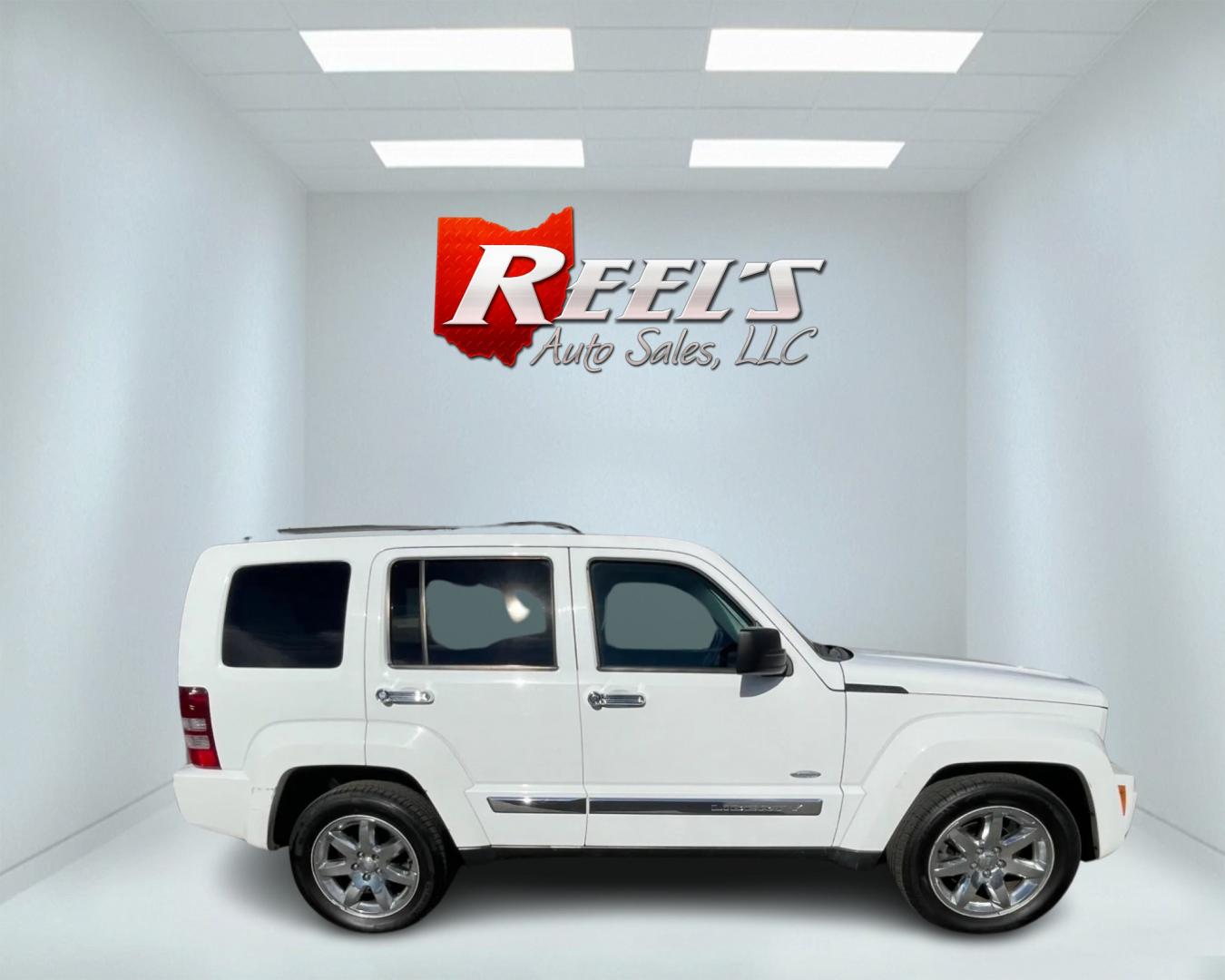 2012 White /Black Jeep Liberty Latitude 4WD (1C4PJMAK0CW) with an 3.7L V6 SOHC 12V engine, 4-Speed Automatic transmission, located at 547 E. Main St., Orwell, OH, 44076, (440) 437-5893, 41.535435, -80.847855 - Photo#7